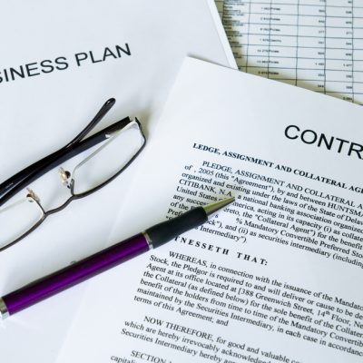 selective focus image of business plan, contract, ballpoint pen and glasses